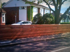 Custom Built Sapele Feature Fence Front of House